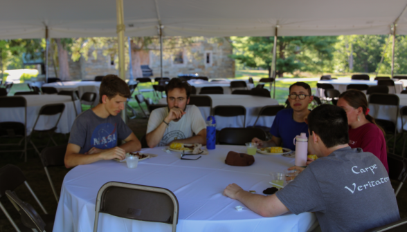 Five at a dinner table