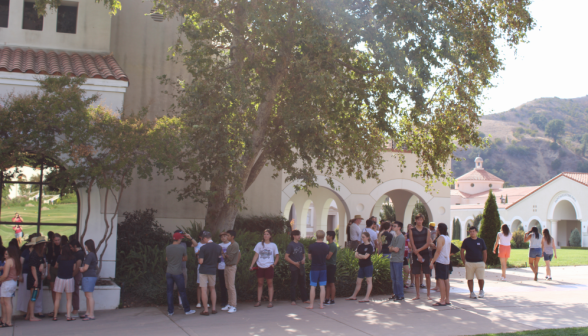 Students line up for the barbecue