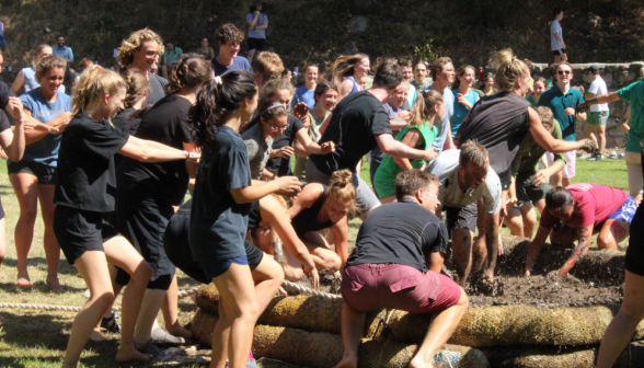 A mud fight breaks out at the puddle