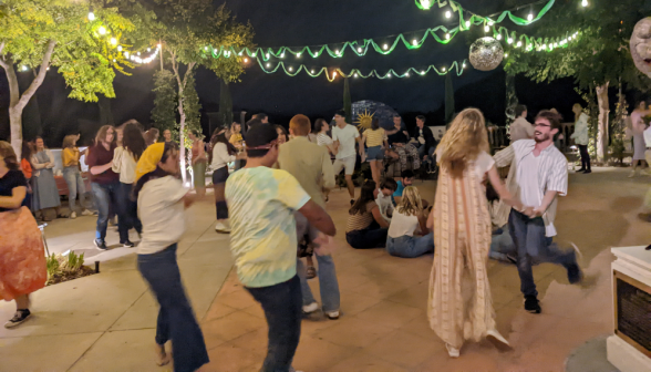 Student couples dancing on Gladys patio