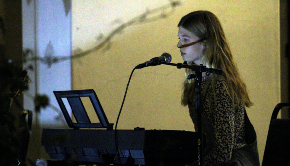 A student at the piano performs