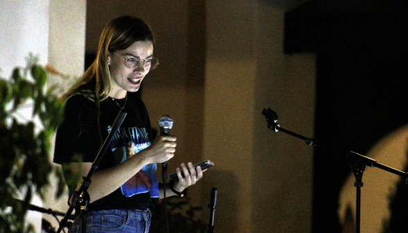 A student performs a skit