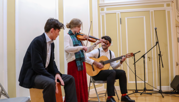 Another shot of the trio performing