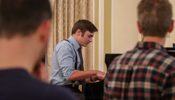 A student performs on the piano