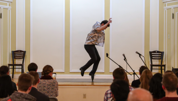 A student performs a solo dance routine