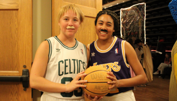 Two dressed as basketball players