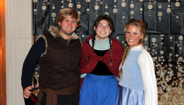 Three dressed as Kristoff, Elsa, and Anna from Frozen (apparently Olaf has melted)