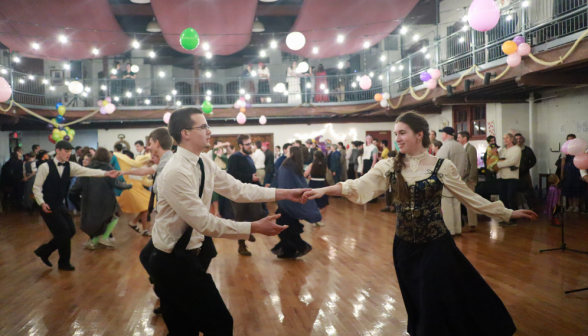 Another pair of students dancing