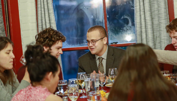 A conversation at one of the tables