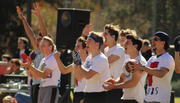 Underclassmen team members cheer offside