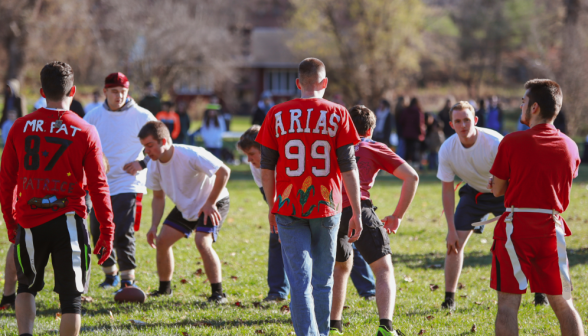 Students get ready at the line of scrimmage