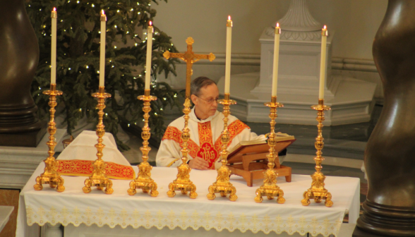 Rev. Stephen Brock at the altar