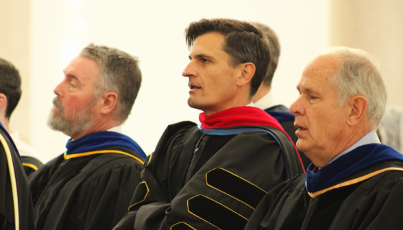 The tutors in the congregation wearing their academic regalia