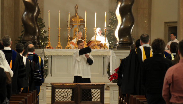 The thurifer incenses the congregation