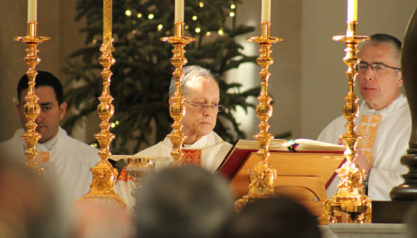 Three priests at the altar