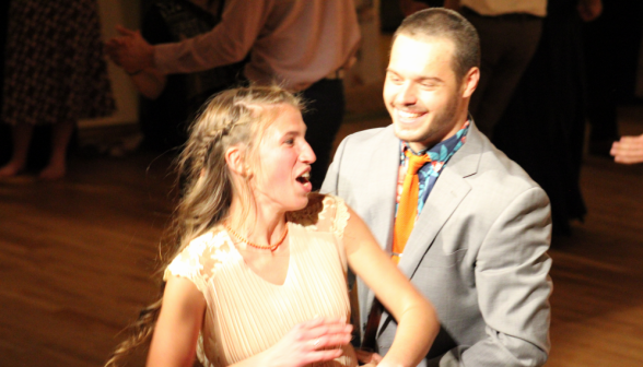 A student couple dances