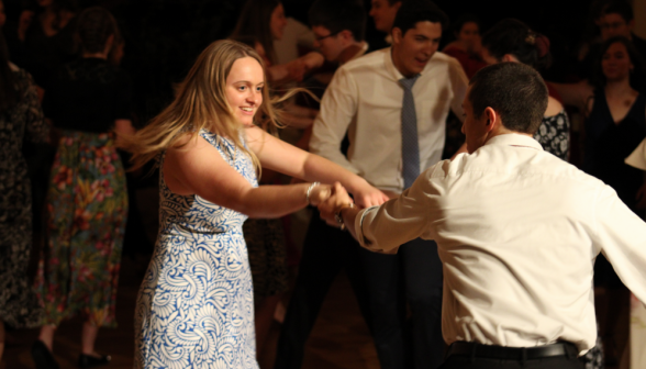 A student couple dances