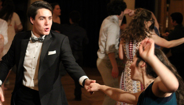 A student couple dances