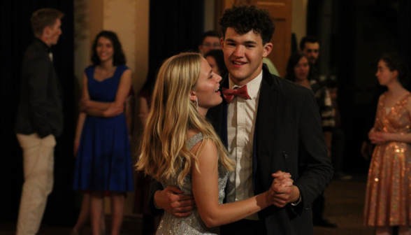 A student couple dances