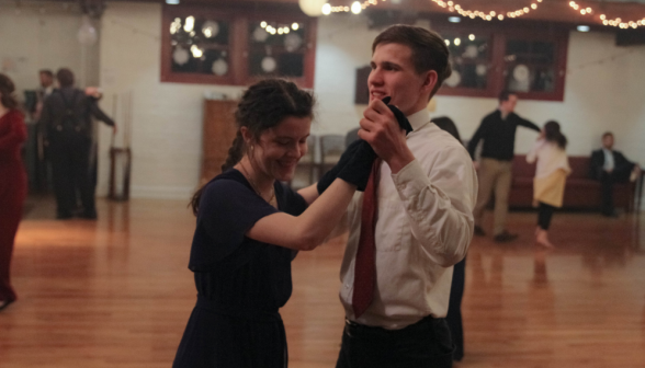 A student couple dances