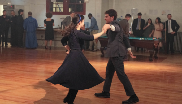 A student couple dances