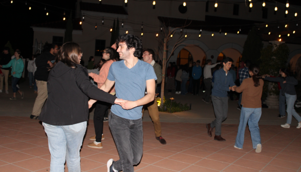 Couples dance on Gladys patio