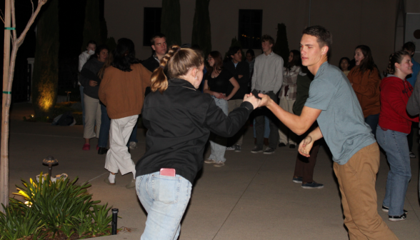 A student pair dances