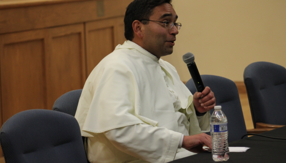 Fr. Miguel addresses the students