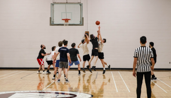 A close fight for the ball over the net