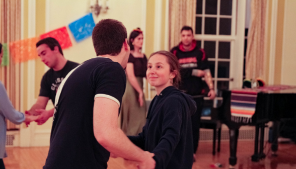 A student pair dances