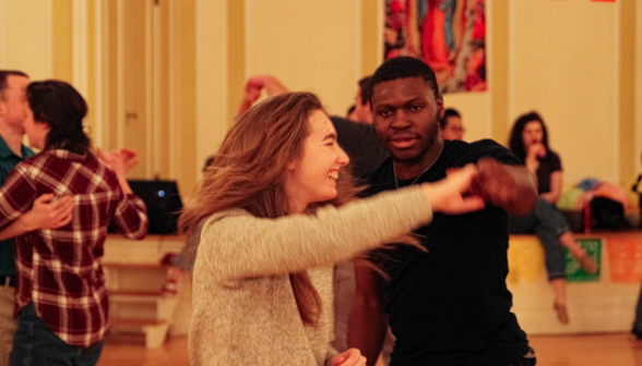 A student pair dances