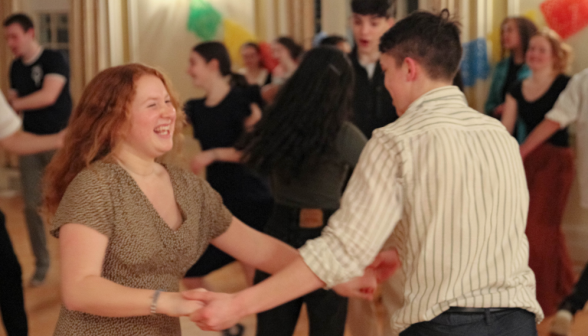 A student pair dances