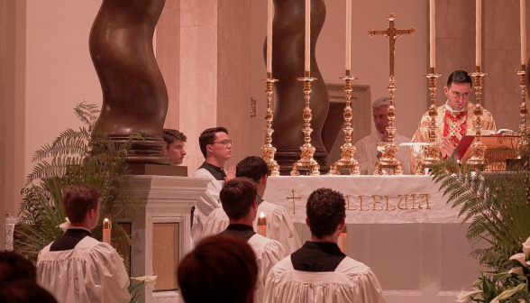 The priest offers Mass