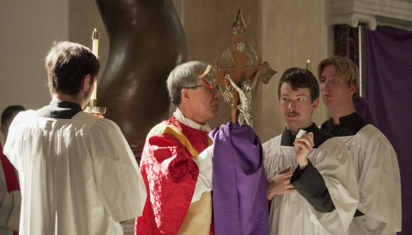 Fr. Chung exposes the Lignum Crucis