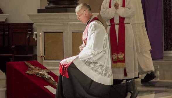 Fr. Marczewski about to venerate the Cross