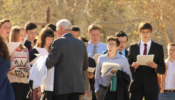 Dan Grimm directs the choir