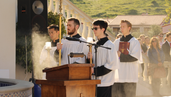 The altar servers at the outdoor pulpit