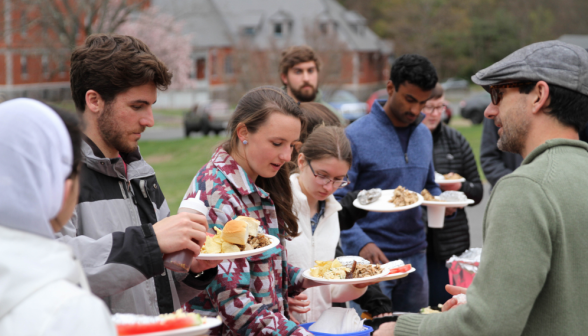 Students go through the dinner line