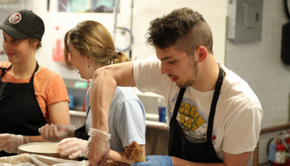 Coffee shop staff serve ice cream