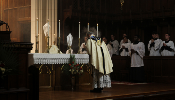 Fr. Viego bows at the altar