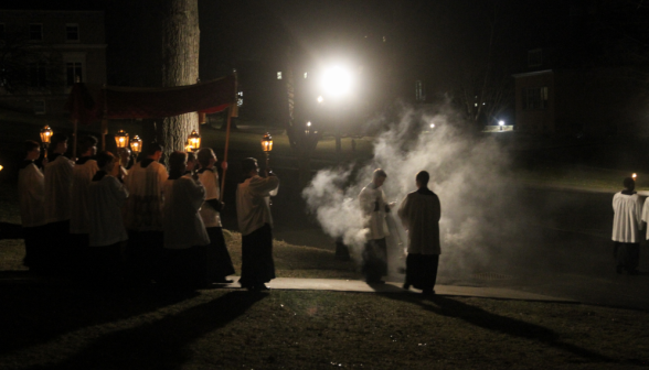 The procession in the night air