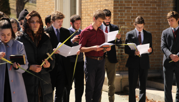 The congregation, palms in hands