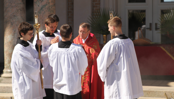 Fr. Markey reads