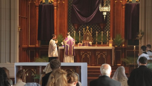 Fr. Markey reads the Gospel