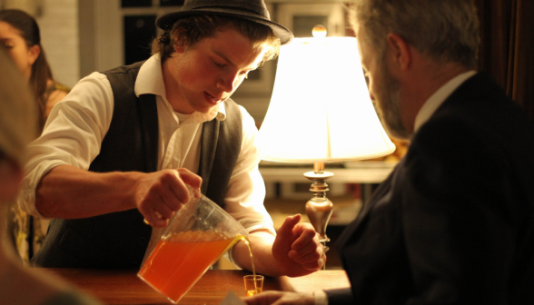 The "bartender" pours a mocktail for Dr. Gardner