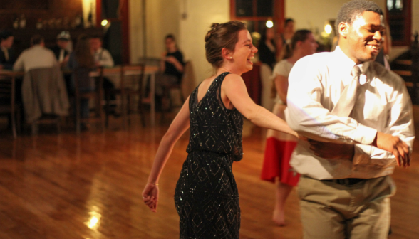 A pair of students dance