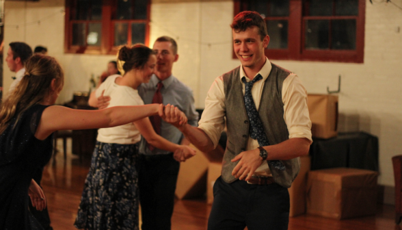 A student couple dances