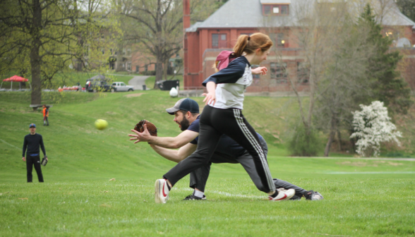 Tutor dives for the catch as the batter runs past