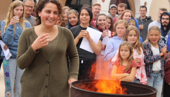 A student burns their draft