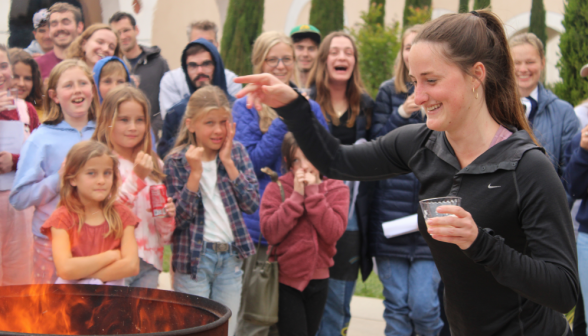 A student burns their draft